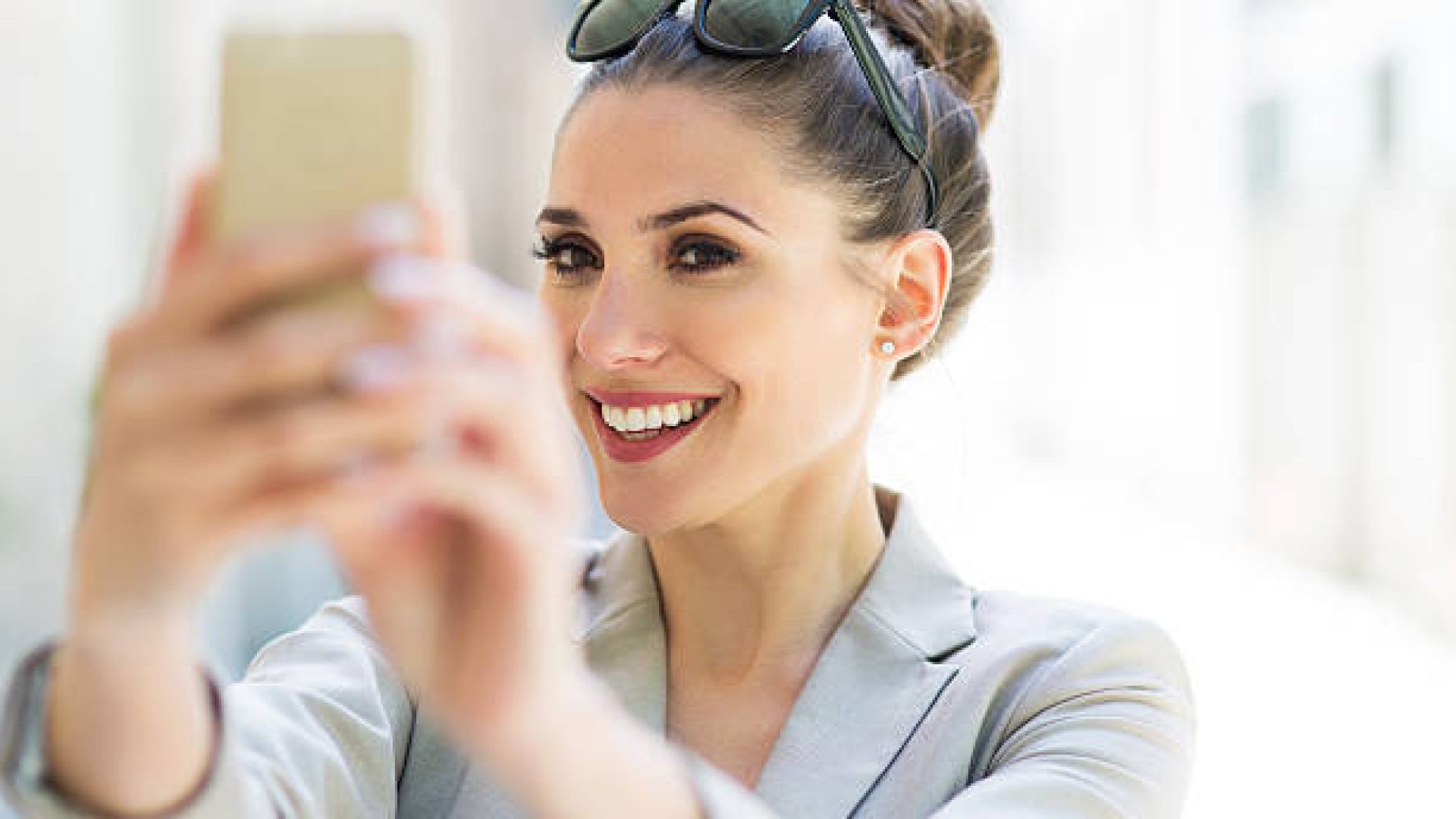 Young businesswoman using her smartphone